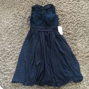 Never worn, beautiful navy blue dress